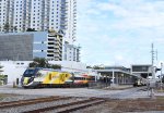 Two Brightline trains meet at the WPB Brightline station in beautiful Downtown WPB